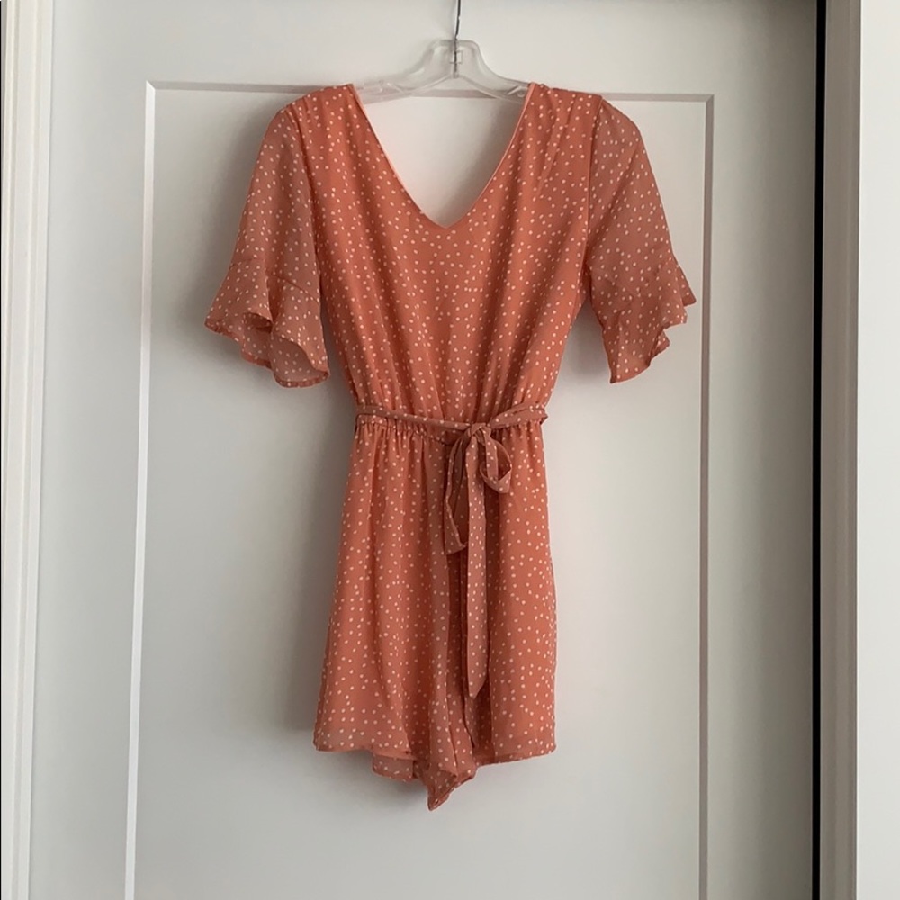 Ruffle sleeve romper with tie waist